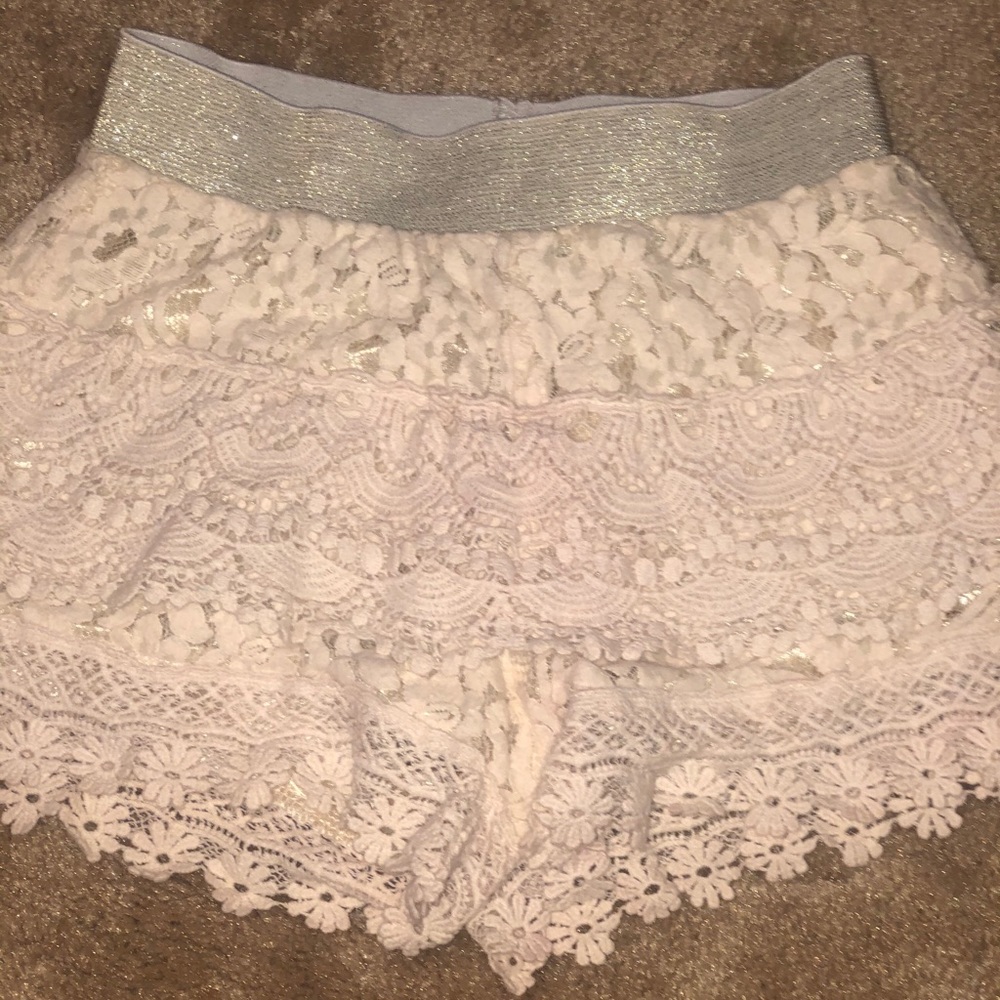 Cream/Beige shorts with gold elastic band